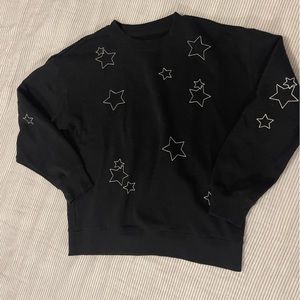 Black sweatshirt with white stars